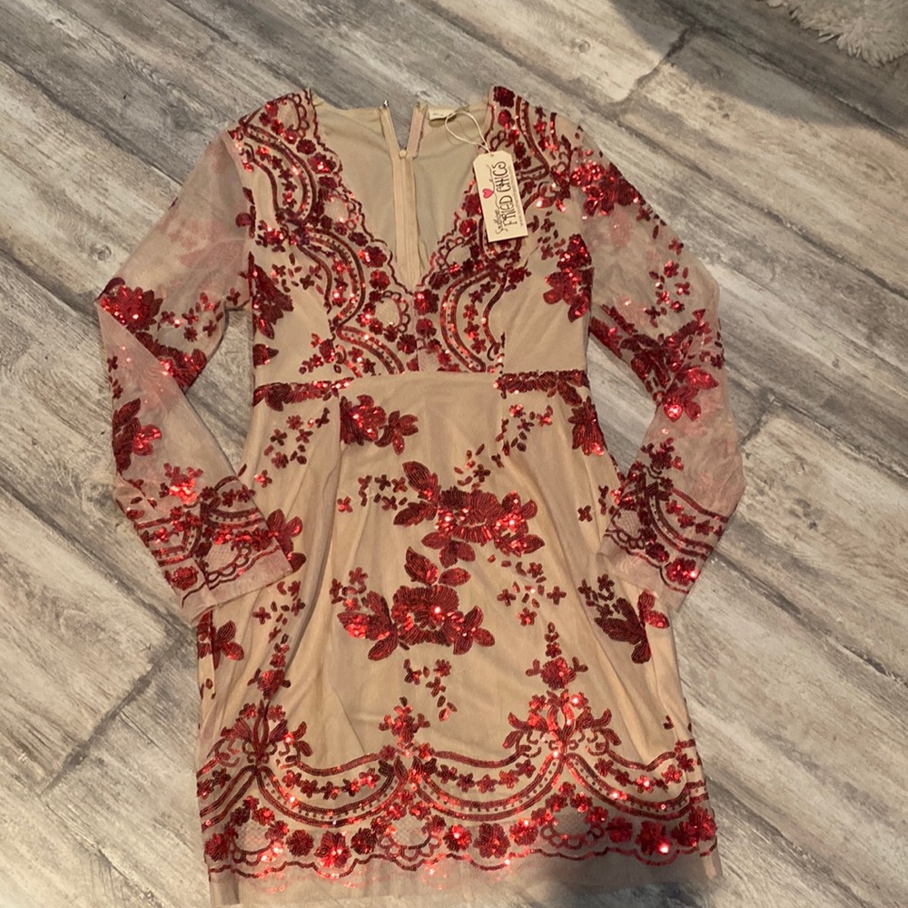 Medium dress, brand new and never worn.